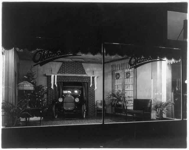 Christmas window display at an unidentified Oldsmobile dealer's, probably in Washington, D.C.