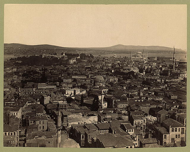 [Aerial view of Istanbul showing Topkapı Sarayı (palace), and Ayasofya and Nuruosmaniye mosques; probably taken from a minaret of the Süleymaniye Camii (mosque)]