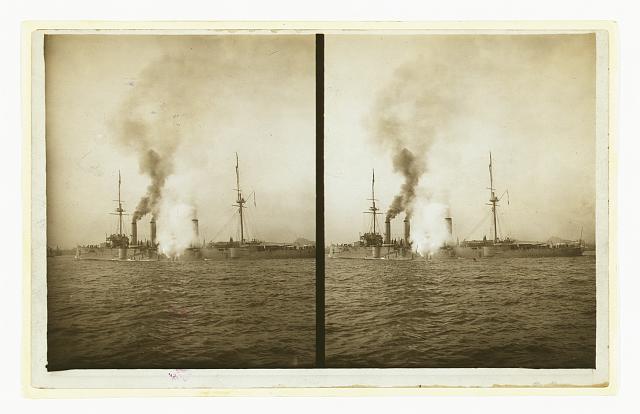 [An American cruiser firing its guns in salute as it arrives in New York, probably at the time of the Portsmouth Peace Conference]