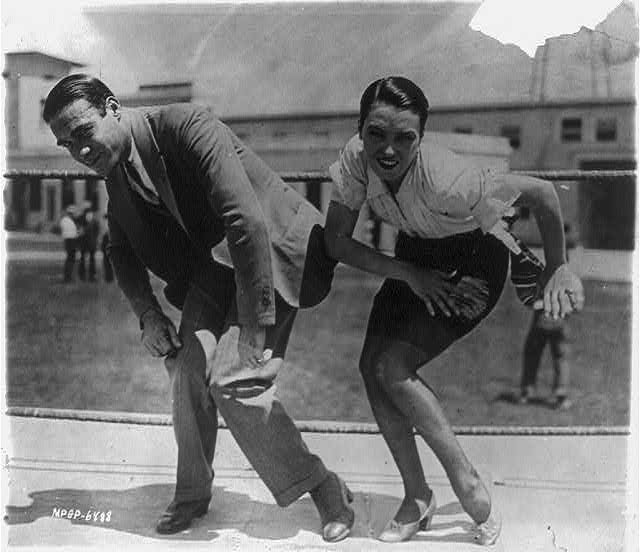 [Frank Farnum - probably not the Western star Frank Farnum - coaching Pauline Starke to do the Charleston for the movie "A Little Bit of Broadway" (release title "Bright Eyes"). May 9, 1925]