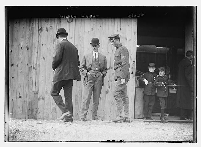 Wilbur Wright with others, probably on Governor's, Island NY