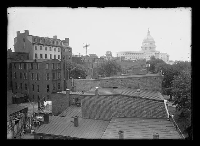 [View of 1st & Delaware?, N.W., New Jersey Ave. & North Capitol Street, N.W., between B & C Streets, probably from Hotel Engel (C & New Jersey), showing roof tops of several buildings and the U.S. Capitol in the background]