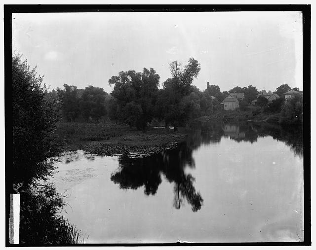 [Waterscape with dwellings at right, probably the Huron River at Ypsilanti, Mich.]