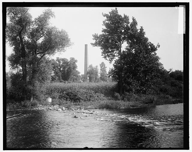 [Smokestack by river, probably the Huron River, Ypsilanti, Michigan]