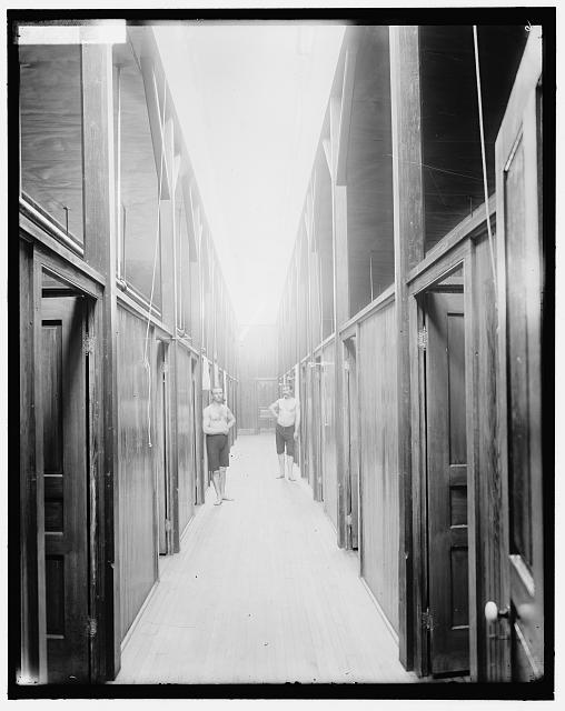 [Two men in corridor, probably the Ypsilanti mineral bath house, Ypsilanti, Michigan]