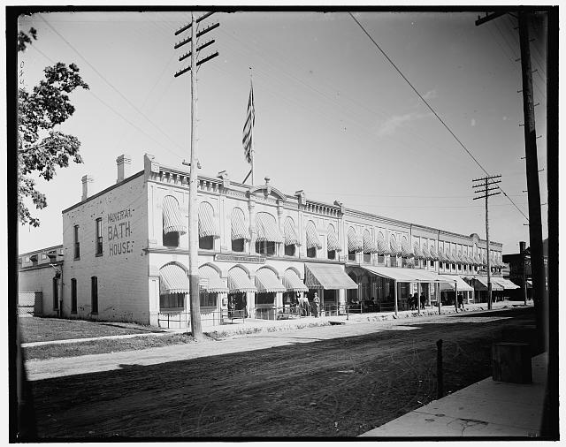 [Commercial block with mineral bath house at left, probably Ypsilanti, Michigan]
