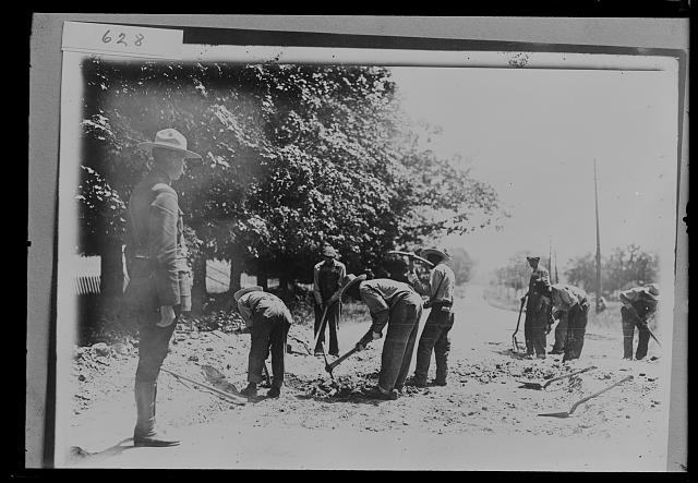[Highway construction crew, probably Michigan State Highway Dept., digging, Michigan]
