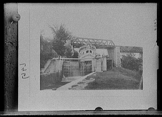 [The Rideau Queen passing through locks, possibly the Rideau Canal, probably Ontario]