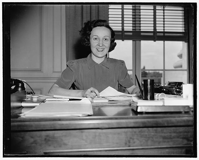 Nation's busiest secretary. Washington, D.C., Aug. 25. Probably the busiest Secretary in the Capitol these days is Eugenia Pope, Secretary and only employee of Wage-Hour Administrator Elmer F. Andrews. The Bureau will employ 1,000 persons in two months, but in the meantime Miss Pope must keep track of 50,000 applications for jobs, 8/25/38
