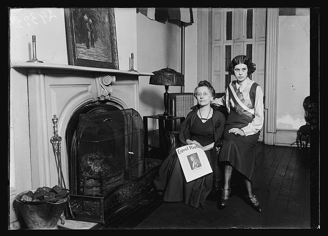 [Two women, probably suffragists or members of the National Woman's Party, with copy of Equal Rights magazine. Washington, D.C.]