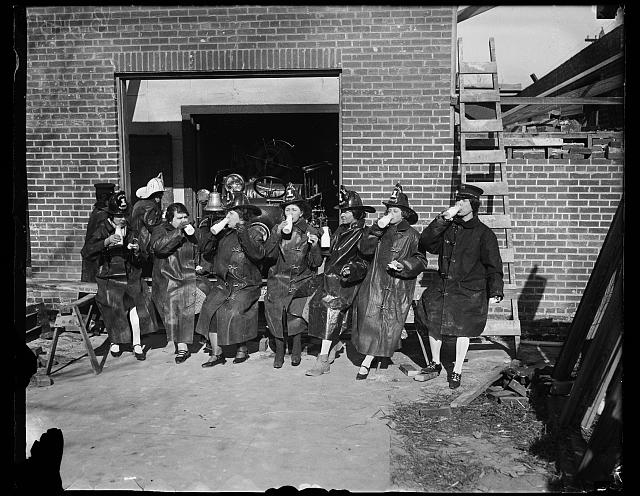 [Probably members of the Jefferson District Fire Department Women's Auxiliary, which supported the construction of the Jefferson District Fireman's Hall and Community House in Arlington, Virginia, seen underway in background]