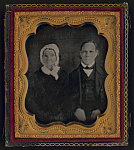 [Unidentified couple, probably husband and wife, three-quarter portrait, seated]