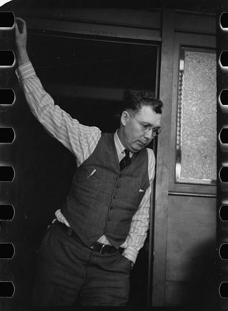 [Untitled photo, possibly related to: U.M.W.A. (United Mine Workers of America) official, Herrin, Illinois. General caption: Williamson County, Illinois once produced 11,000,000 tons of coal a year, and led the state in output.  Since 1923 output has steadily declined until now it falls short of 2,000,000 tons. At one time, sixteen mine whistles blowing to work could be heard from the center of Herrin. Now only two mines are working and these two will probably be abandoned within the next year. The Herrin office of the U.M.W.A. was once the most active in the state. Today it is no longer self sustaining. These pictures were taken in the Herrin U.M.W.A office on a day when the mines were not working]