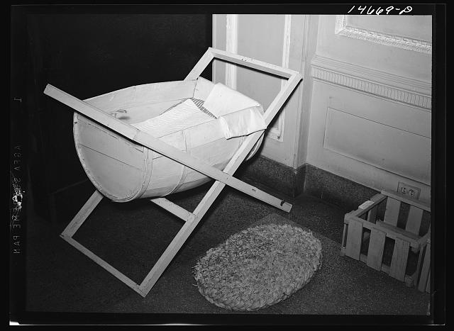 Crib made from scrap materials, probably on a Farm Security Administration project