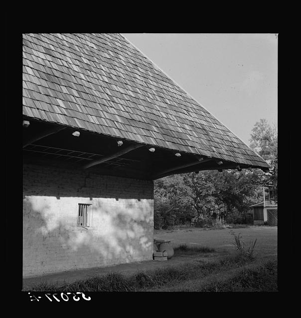 Melrose, Natchitoches Parish, Louisiana. "African" house, probably storeroom, smokehouse, or jail when built by mulattoes, now part of John Henry cotton plantation, originally the Yucca Plantation (from Spanish). See general caption