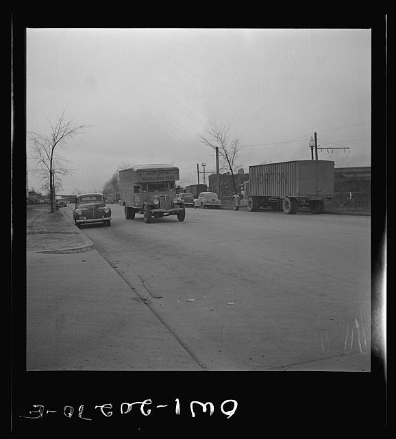 [Street with trucks, probably New York Avenue, N.E., Washington, D.C.]