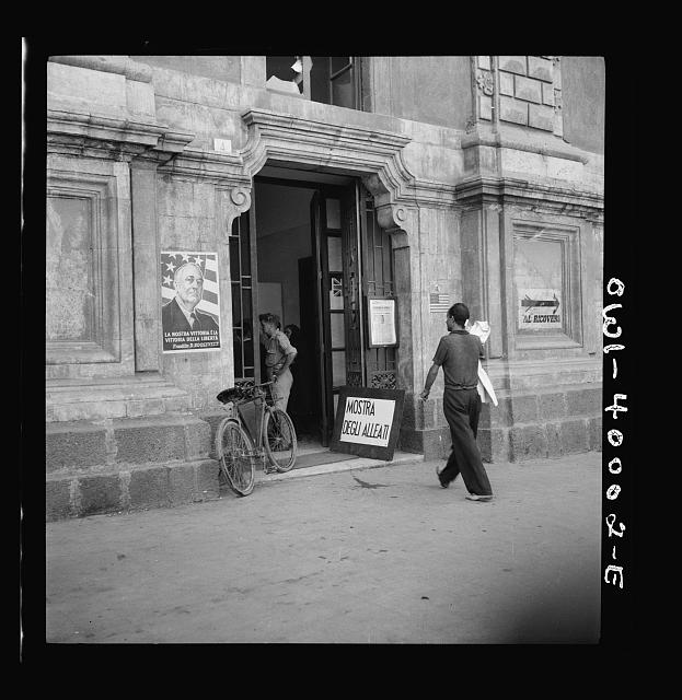 Catania, Sicily. Entrance to an exhibition on the allied cause, probably prepared by the United States Office of War Information