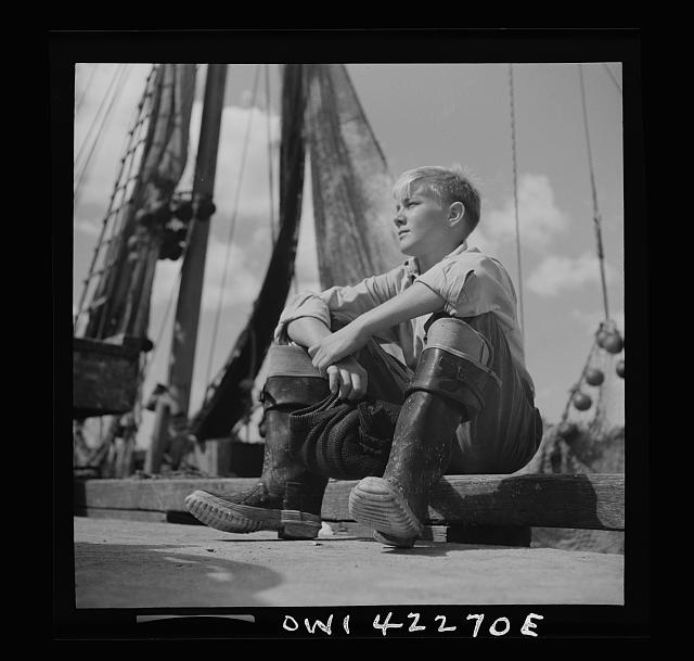 Gloucester, Massachusetts. A young Gloucester boy, probably a fisherman of tommorrow, because many of the boys follow their forefathers as fishermen in the New England waters