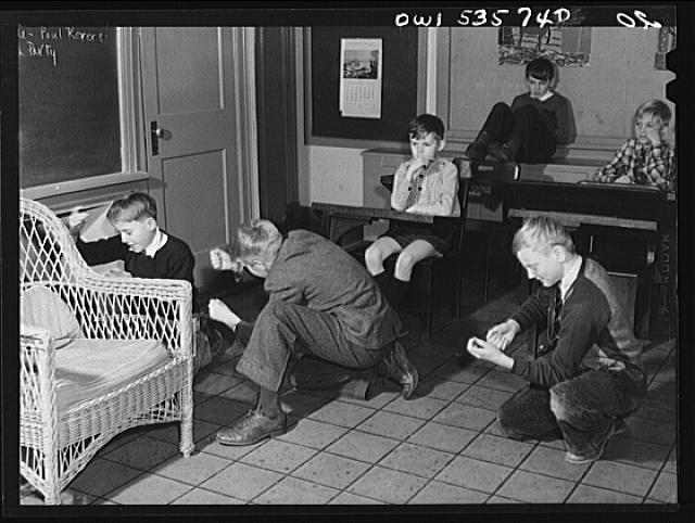 Wilmington, Delaware. Tower Hill School, noted country day school for pupils from three to eighteen years of age. Children watching their classmates act out a scene from history, probably the Boston Tea Party