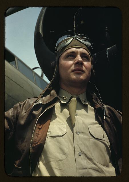 [U.S. Army Air Forces pilot in front of a YB-17 bombing airplane, probably Langley field, Virginia]