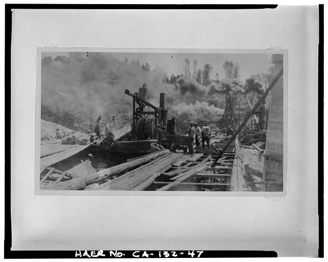 47.  Pouring deck columns, steam-powered concrete mixer at center; direction of view not clear, but probably to north. - Parks Bar Bridge, Spanning Yuba River at State Highway 20, Smartville, Yuba County, CA