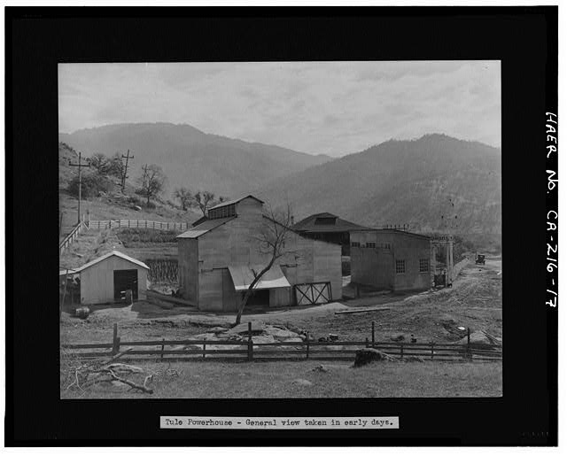 17.  Photocopy of photograph (original copy in Edison collection). Photographer and date unknown, although probably taken before 1920. VIEW OF NORTH END OF TULE RIVER POWERHOUSE SHOWING POWERHOUSE AT PHOTO CENTER, TRANSFORMER BUILDING TO RIGHT OF POWERHOUSE, GARAGE TO LEFT OF POWERHOUSE, AND OPERATOR COTTAGE BEHIND POWERHOUSE AND TRANSFORMER HOUSE. VIEW TO SOUTHEAST. - Tule River Hydroelectric Project, Water Conveyance System, Middle Fork Tule River, Springville, Tulare County, CA