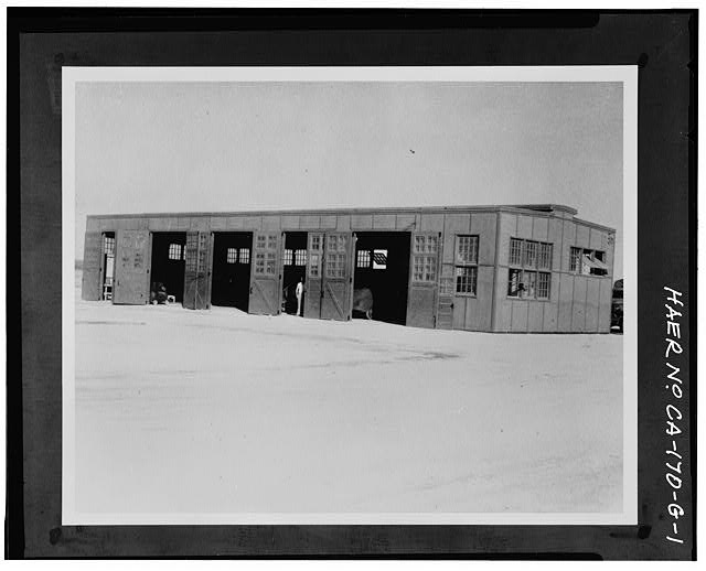 Credit USAF. Original housed in the Photograph Files, AFFTC/HO, Edwards AFB, California. View of Motor Repair Shop (originally  T-16), probably shortly after completion in 1943 - Edwards Air Force Base, North Base, Motor Repair Shop T-16, Third & C Streets, Boron, Kern County, CA