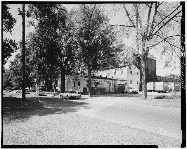 1.  Light brick buildings on left constitute 1885 mill built by George Woodruff; lower section was probably a leading area. - Empire Mills Company, Front Avenue between Eighth & Tenth Streets, Columbus, Muscogee County, GA
