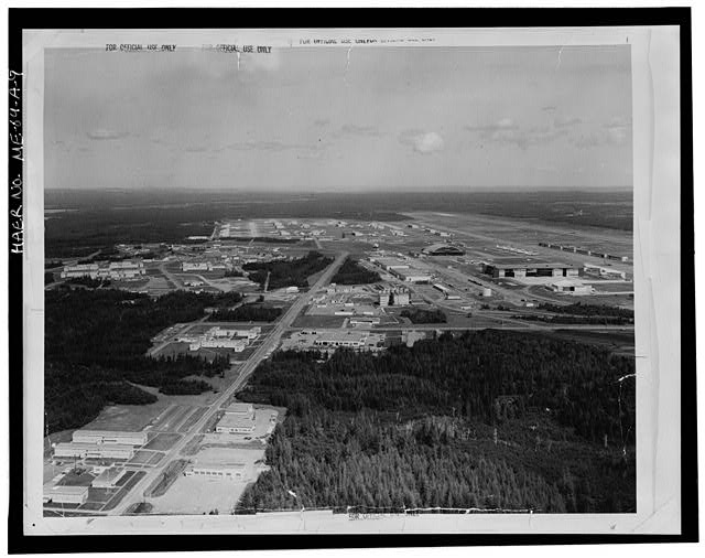 9.  COPY OF UNDATED OBLIQUE AERIAL PHOTOGRAPH WEST SIDE OF BASE, PROBABLY TAKEN IN THE 1960'S.  PHOTOGRAPH LOCATED AT AIR FORCE BASE CONVERSION AGENCY, LORING AIR FORCE BASE, MARINE. - Loring Air Force Base, Airfield, Central portion of base, Limestone, Aroostook County, ME