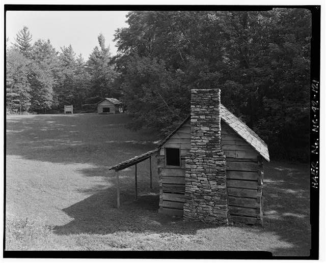 121.  E.B. Jeffress Recreational Area. View of the Cool Springs Baptist Church on the left and the Jessie Brown Cabin on the foreground. The church when acquired by the Park Service was being used as a barn, probably its most common function. Looking south-southwest. - Blue Ridge Parkway, Between Shenandoah National Park & Great Smoky Mountains, Asheville, Buncombe County, NC
