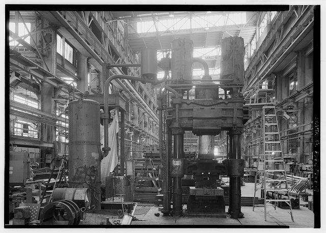 View south of hydraulic hammer in boilermakers shop (probably the oldest piece of equipment in the yard, originally powered by steam) nameplate: United Engineers and FDRY. Co. Pittsburgh, Pa, USA Davy Brothers LTD. Patents - Aug 1, 1905, Feb, 1901, Sept 8, 1908 - 10000 lbs. - Naval Base Philadelphia-Philadelphia Naval Shipyard, Structure Shop, League Island, Philadelphia, Philadelphia County, PA