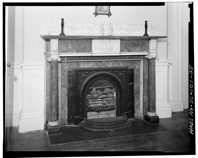 35.  SECOND FLOOR, SOUTHEAST ROOM, NORTH WALL: BLACK MARBLE MANTLE. Grape clusters above columns repeat in upper part of cornice and probably in destroyed ceiling centerpiece - Governor Thomas Bennett House, 1 Lucas Street, Charleston, Charleston County, SC