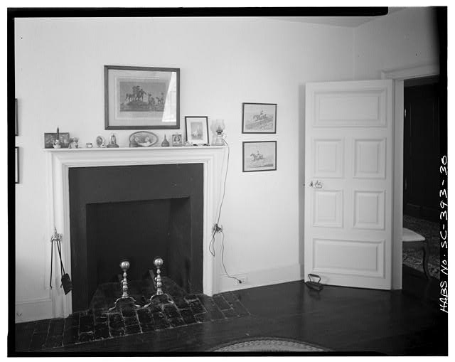 30.  SECOND FLOOR, NORTHEAST ROOM, SOUTH WALL. Bolection mold fireplace surround probably original with house and only remaining one thus. Note bolection panel molds on raised-panel door, also probably original with house. - Mulberry, Cooper River, West Branch, Moncks Corner, Berkeley County, SC