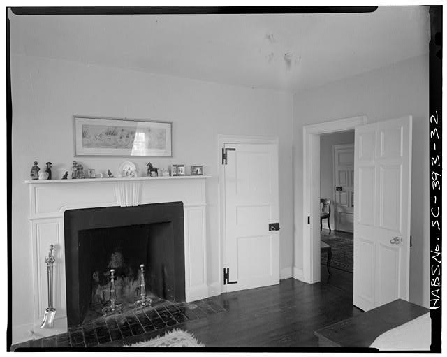 32.  SECOND FLOOR, SOUTHWEST ROOM, NORTH WALL. Flat-panel door is ca. 1800. The raised-panel door is probably original with house. Also note mantle. - Mulberry, Cooper River, West Branch, Moncks Corner, Berkeley County, SC