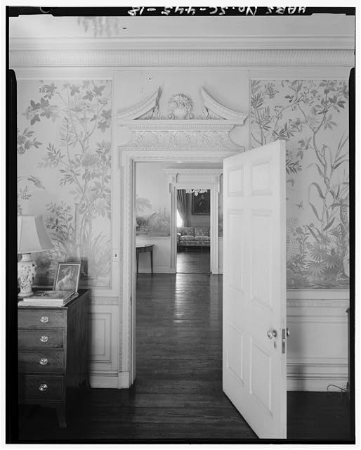 18.  SOUTHEAST ROOM, FIRST FLOOR: DOOR AND CORNICE (ca. 1929 addition). WAINSCOT, CAP AND BASE PROBABLY ORIGINAL. LOOKING THRU HALL TO SOUTHWEST ROOM - Gibbes House, 64 South Battery Street, Charleston, Charleston County, SC