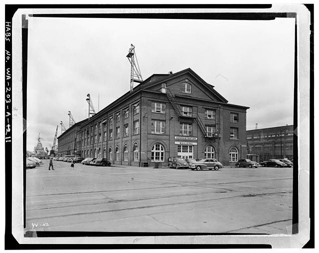 11.  Photocopy of photograph in the collection of Photographic Branch, Puget Sound Naval Shipyard, Bremerton, WA. Original is labelled: Yard Photo 42. Date unknown, probably 1940's. Photographer unknown. HABS negative is a 4x5' copy negative. Perspective view of NE corner of Building 78. - Puget Sound Naval Shipyard, Administration Building, Farragut Avenue, Bremerton, Kitsap County, WA
