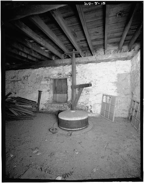 15.  STONE BURR MILL PROBABLY USED FOR GRINDING FEED. ONLY REMAINING MILL MACHINERY William E. Barrett, photographer, 1973 - Thomas Shepherd's Grist Mill, High Street Vicinity, Shepherdstown, Jefferson County, WV